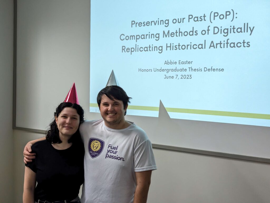Abbie Easter and her husband, Parks Easter, Celebrate her thesis defense.